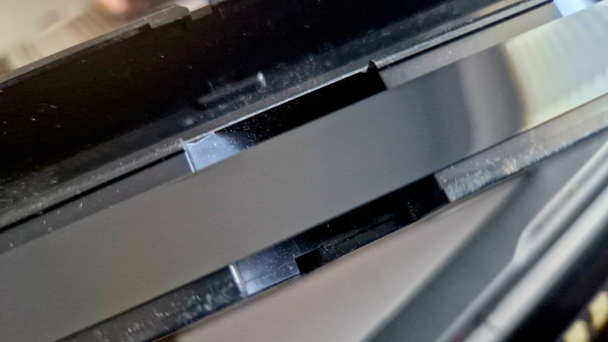 Close-up of a video tape cassette showing signs of wear